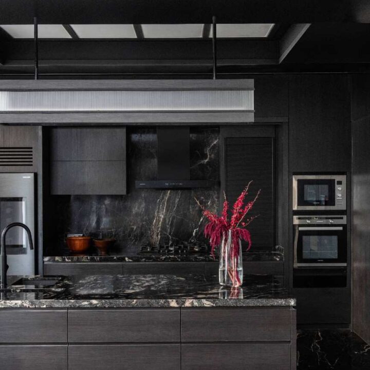 Minimalist white kitchen with wooden accents