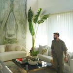 Minimalist white kitchen with wooden accents