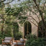 Open concept dining area with statement chandelier